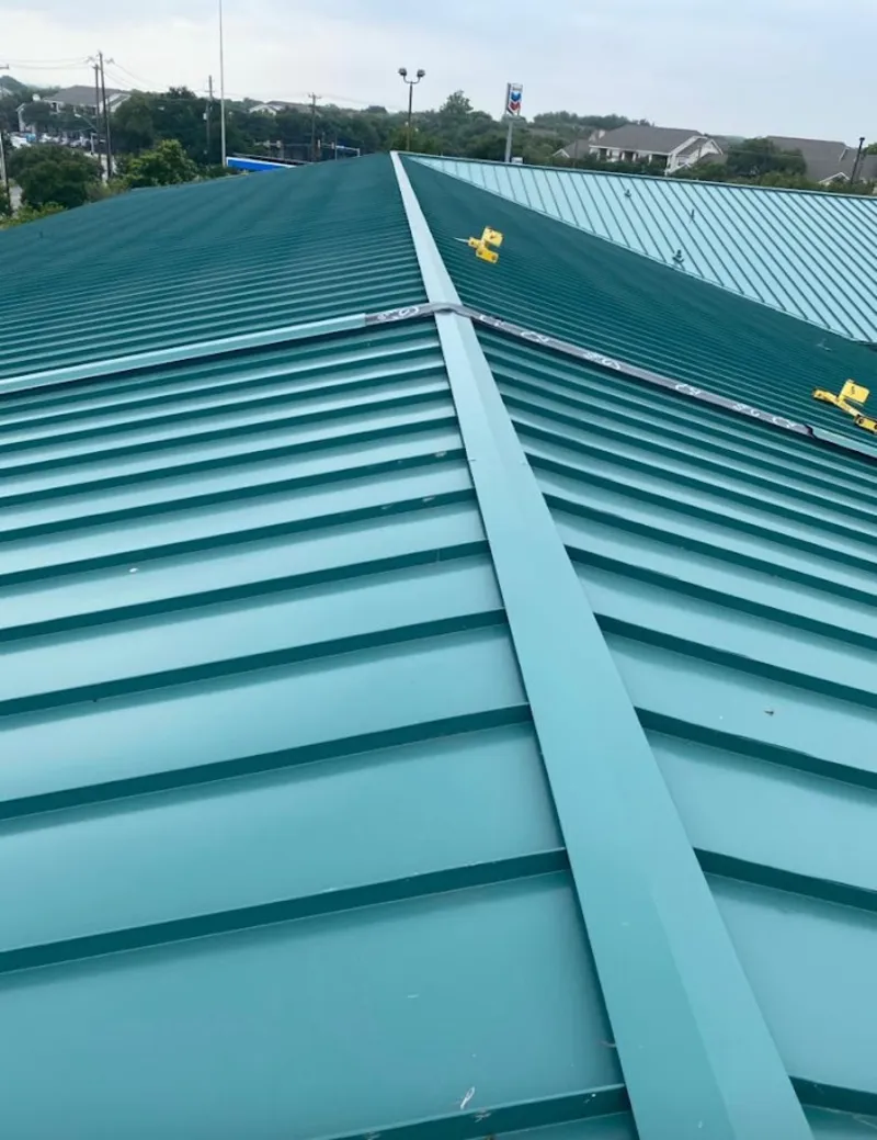 Green commercial metal roof ridge and valley for Metal Roof Repair in Smithfield